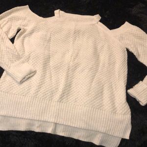 Open shoulder sweater with opalescent sparkle